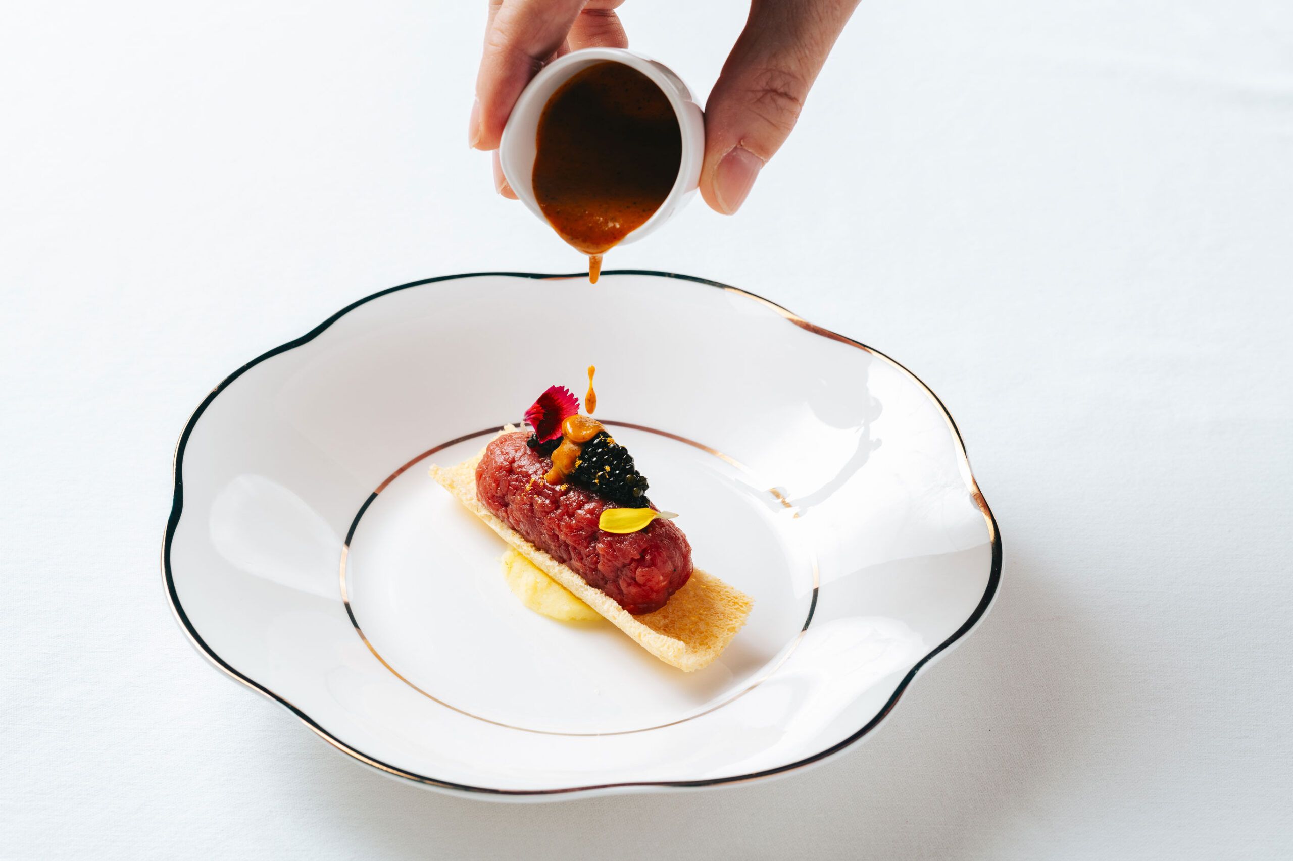 beef-tartare-hand-1-scaled.jpg